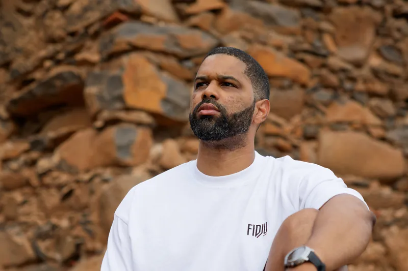 Front of the Fidju Ink shirt — small embroidered FIDJU INK chest logo, oversized fit.