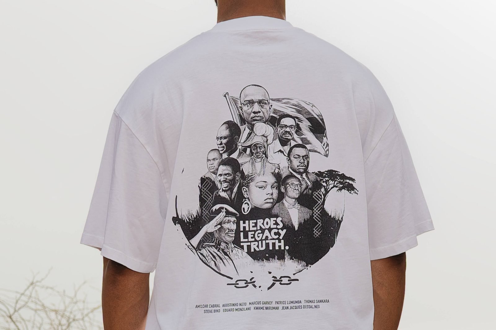 The back of the Fidju Ink shirt — the hand-illustrated print of nine African liberation heroes.
